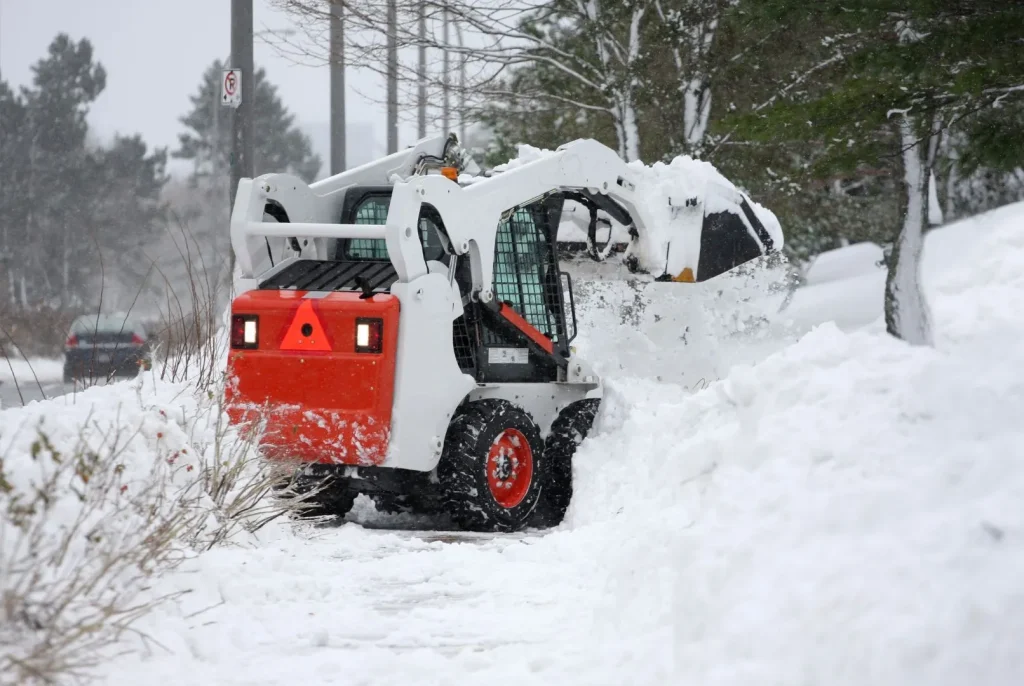 commercial snow removal services with skid steer 